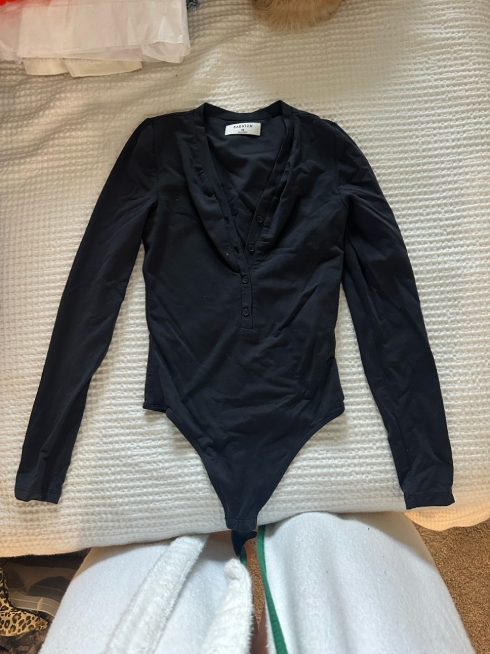 Babaton Black Long-Sleeve V-Neck Button Bodysuit